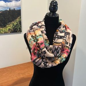 Add color to any outfit with this multicolor infinity scarf